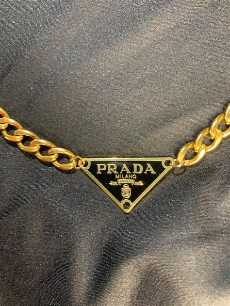 prada gold chain necklace|prada symbol necklace.